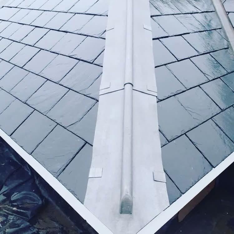 Leadwork and valley detail repaired with clean sealed transitions